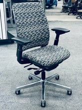 Load image into Gallery viewer, Pre-owned Steelcase Amia task chair in a patterned grey with ergonomic features