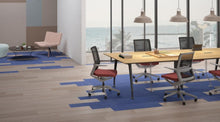 Load image into Gallery viewer, chicagoofficechair.com - vello conference chair - beniia office furniture - collaborative space with ocean background - modern office design - gray mesh orange fabric office chairs in modern office space - beniia.com/vello