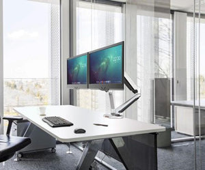 Beniia office furniture - VIO-2 - monitor arm in silver - modern office space - window wall - ergonomic tools -executive manager office - beniia.com